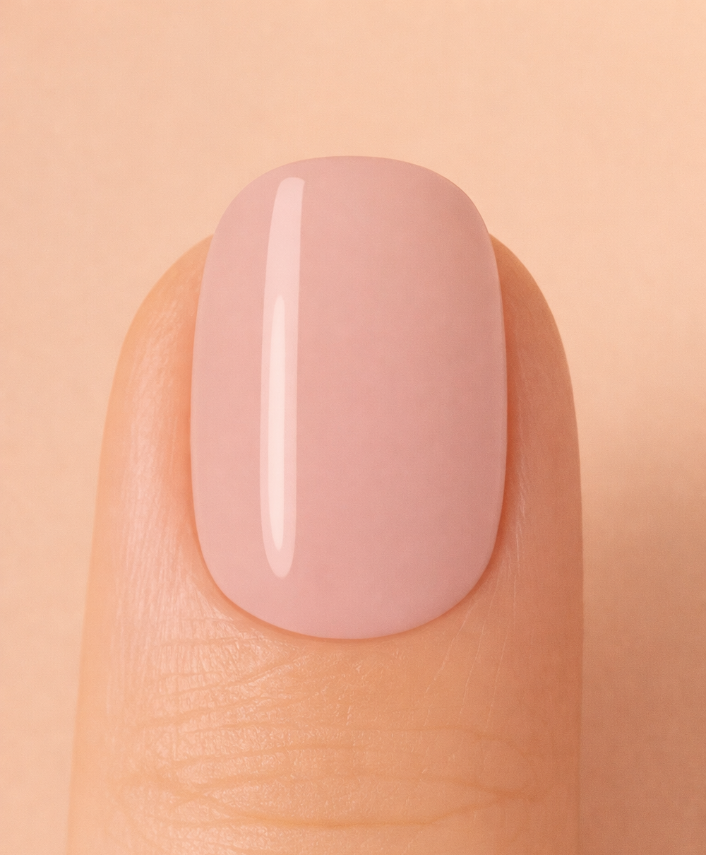 Nude nail on beige background
