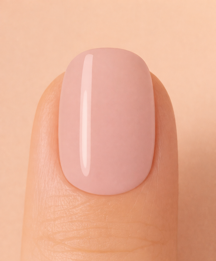 Nude nail on beige background