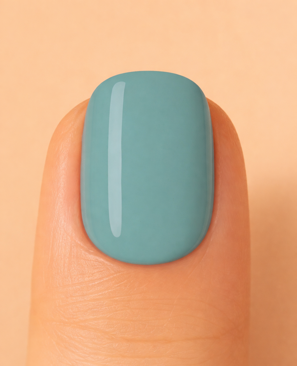 Teal colour nail on beige background